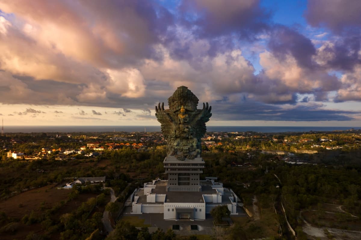 Travel destination: Bali, Indonesia. Tropical paradise with ancient temples and stunning beaches. Rating: 4.9 stars.