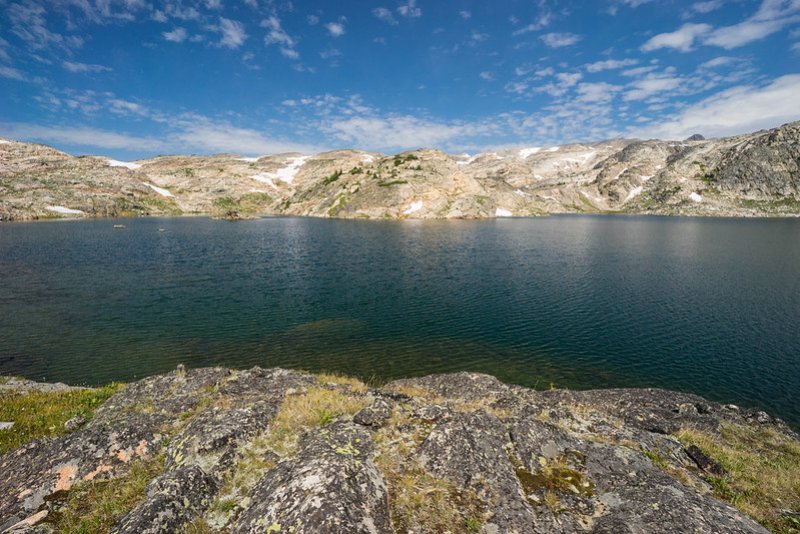 View of Absaroka-Beartooth Wilderness, Montana across the lake 