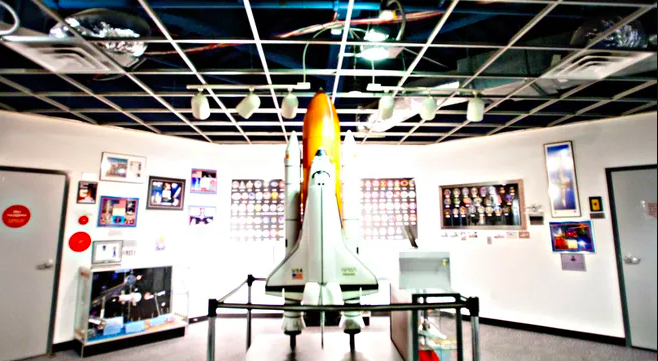 rocket replica at the Challenger Space Center