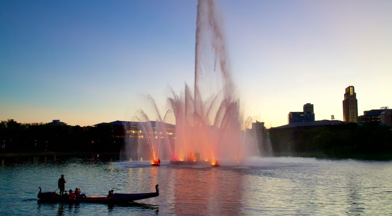 boating near the lighted fountain at Heartland of America Park