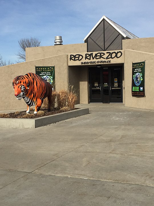 a replica tiger at the entrance of Red River Zoo