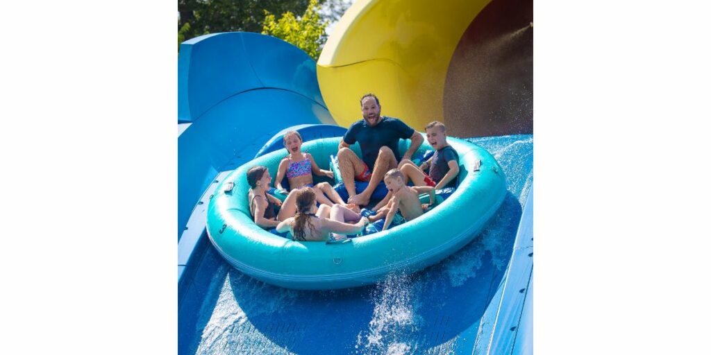 Family having fun at a water slide in Splashin' Safari in Indiana