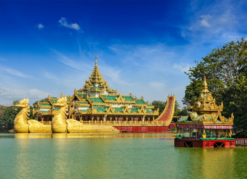 Yangon icon landmark and tourist attraction: Karaweik - replica of a Burmese royal barge at Kandawgyi Lake, Yangon, Myanmar (Burma)