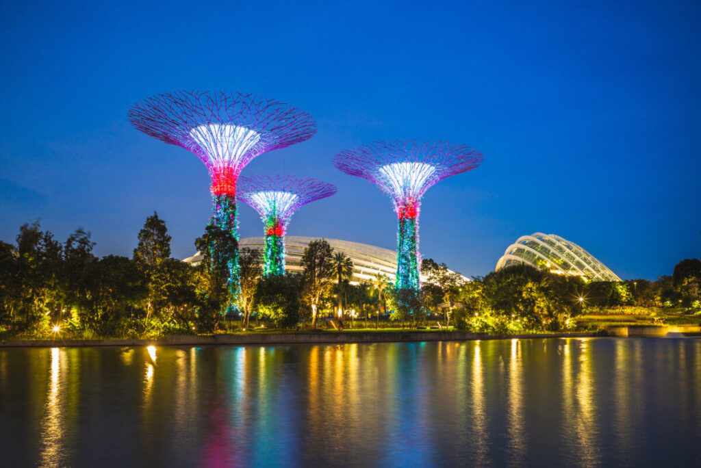 Scenery of Gardens by the Bay with Flower Dome, Cloud Forest, and Supertree Grove at the marina bay at night