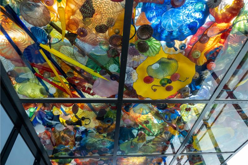 You can walk the 500-foot pedestrian Chihuly Bridge of Glass to see a stunning collection of glass art created by world-renowned artist Dale Chihuly.
