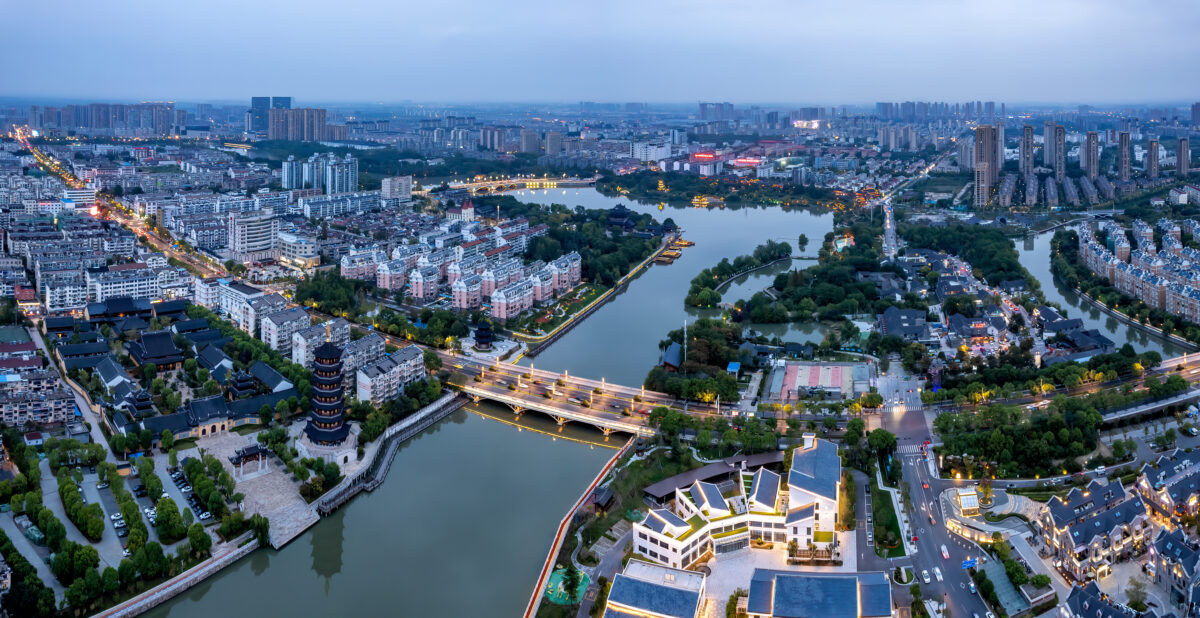 Aerial photography night view of Taizhou city skyline in China