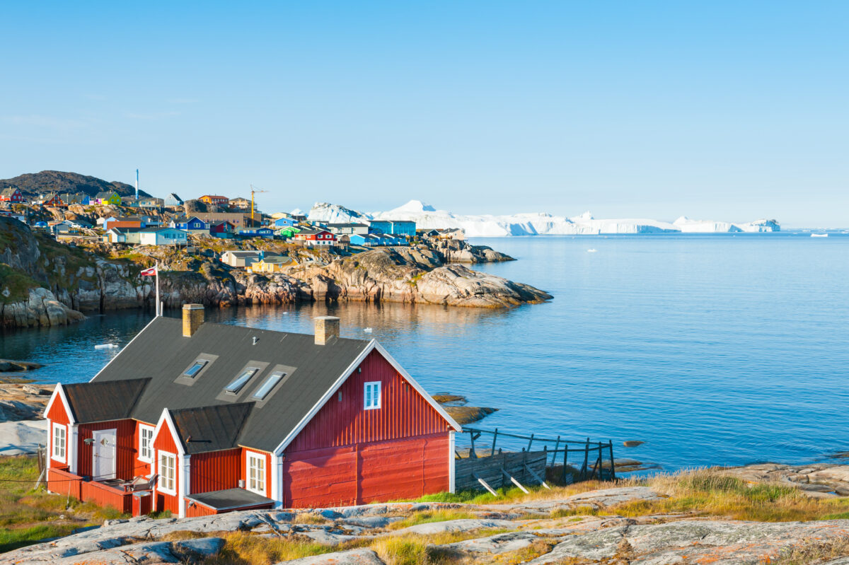 Colorful houses on the shore of Atlantic ocean in Ilulissat, western Greenland