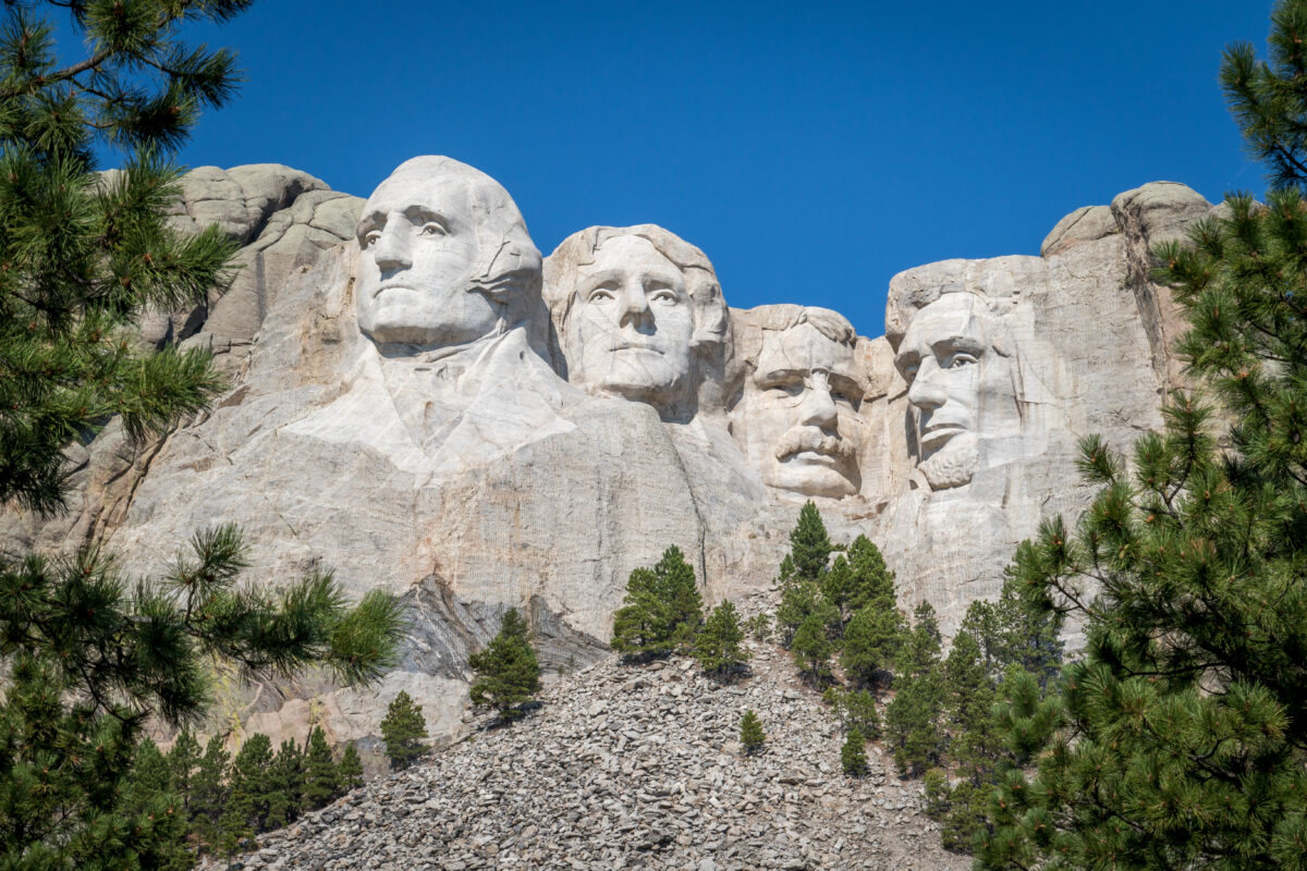 The Carved Busts of George Washington, Thomas Jefferson, Theodore “Teddy” Roosevelt, and Abraham Lincoln at Mount Rushmore National Monument | tourist attractions in the us
