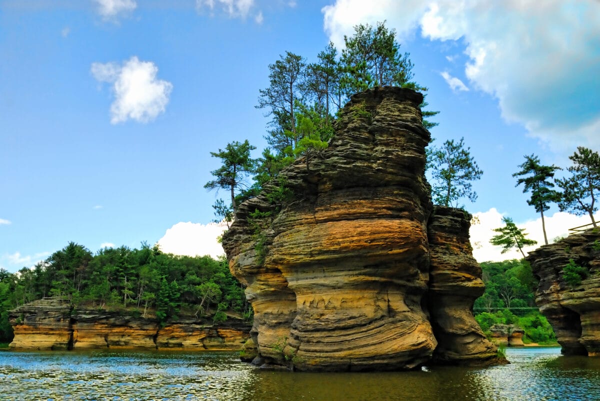 A river view of a Wisconsin Dells sandstone formation.