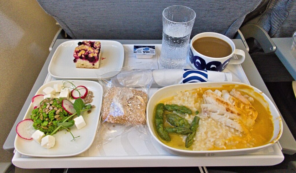 Being mindful of other people, avoiding strong-smelling items, and minimizing accidents are all part of proper in-flight food and drink etiquette.