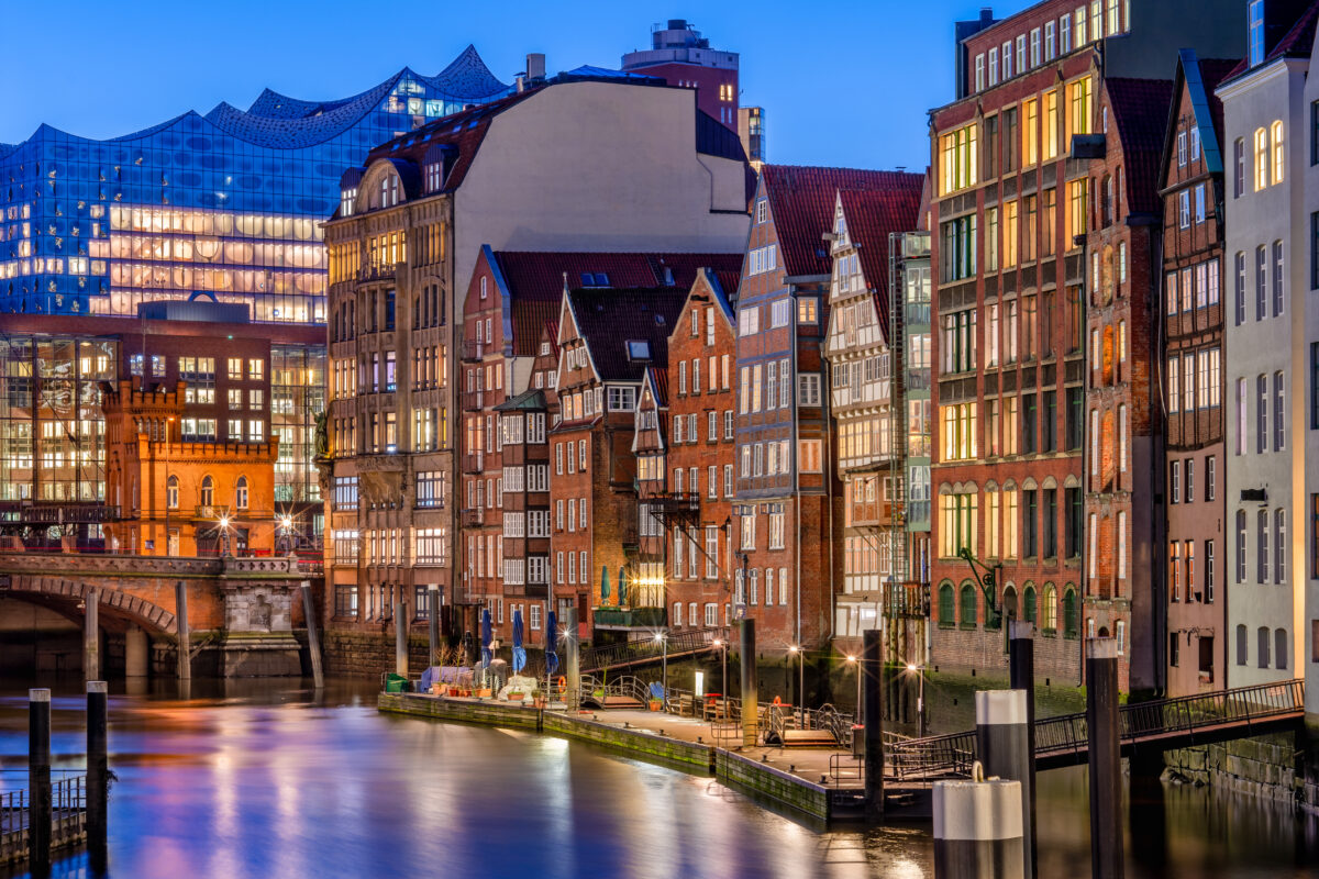 The Nikolaifleet in Hamburg, Germany, at dusk. It is a canal in the old town (Altstadt) and is considered one of the oldest parts of the Port of Hamburg.