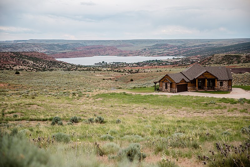 Casper, Wyoming, a bustling city on the North Platte River, featuring a modern skyline set against the backdrop of Casper Mountain and offering diverse recreational opportunities.
