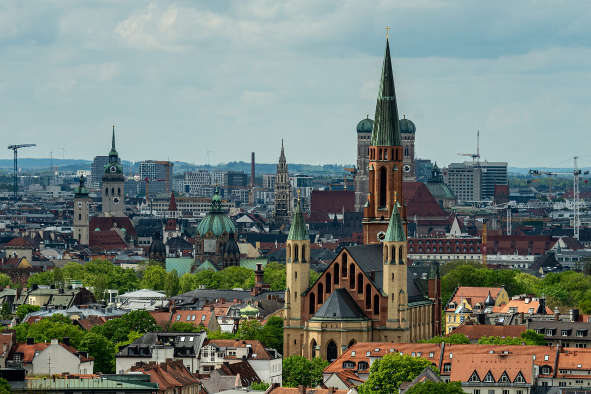 The Munich Frauenkirche is hidden behind the old Haidhausen church
