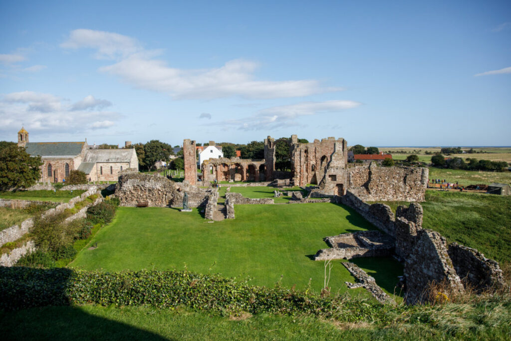 Ruins of Lindisfarne Priory on Holy Island, England showcasing historical architecture