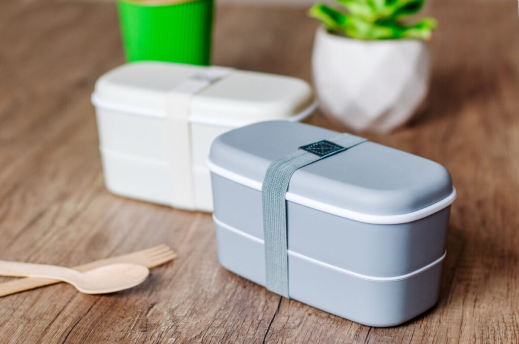 Close-up of two plastic lunch boxes