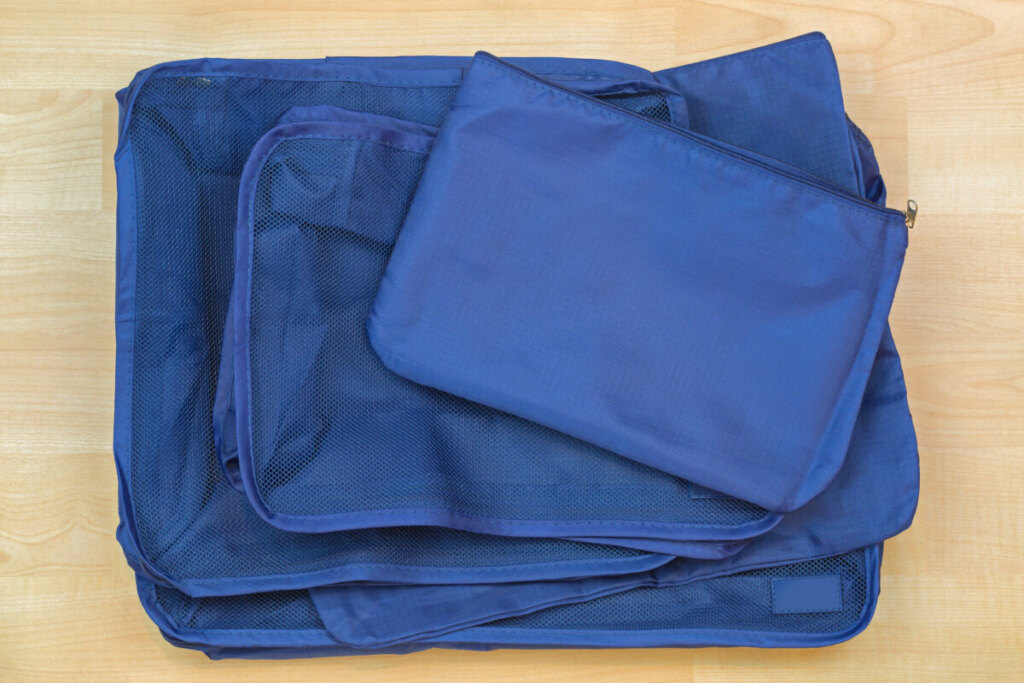 A set of blue packing cubes