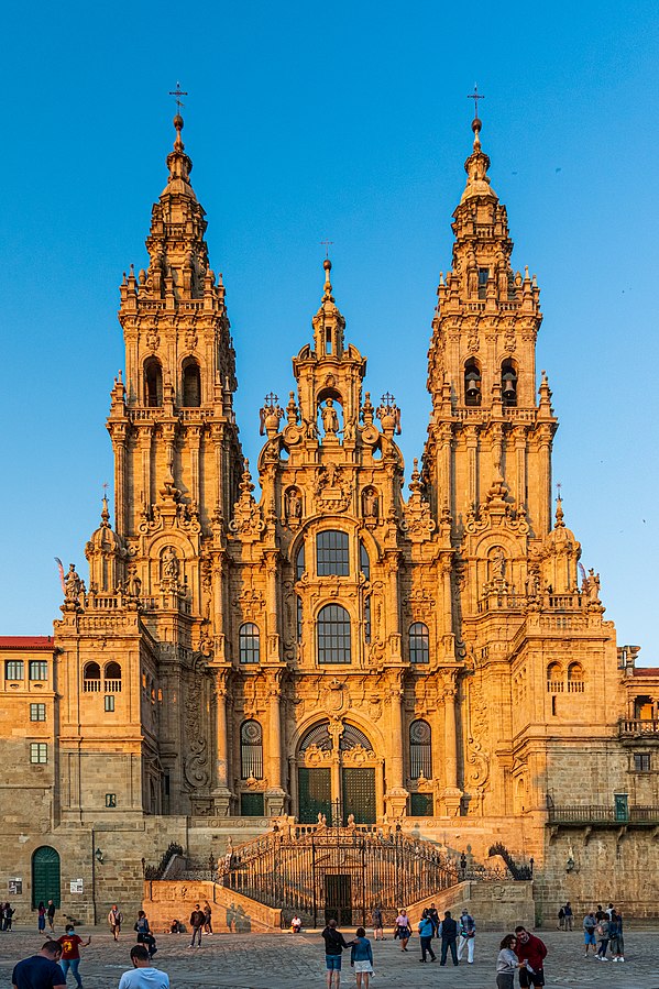 West façade of the Santiago de Compostela cathedral during sunset.