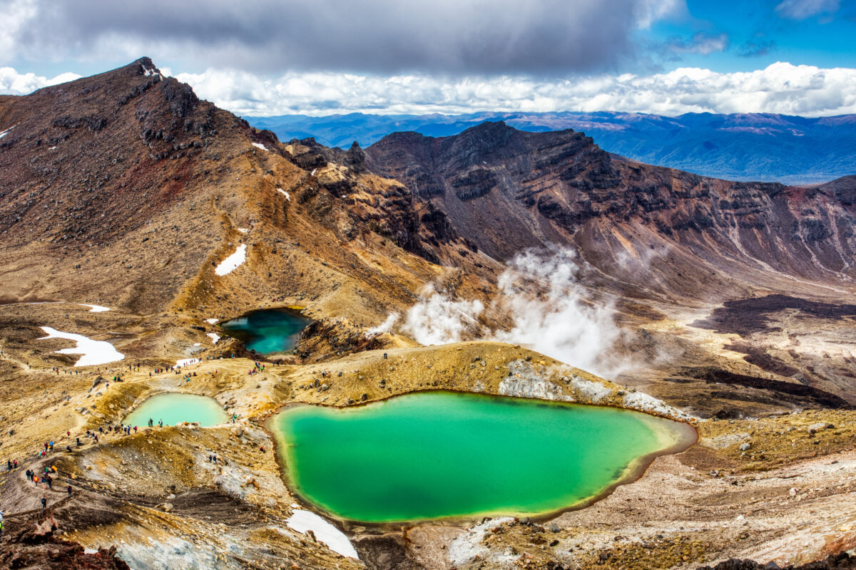 Vibrant emerald lakes along the spectacular Tongariro Alpine Crossing volcanic hiking trail in New Zealand