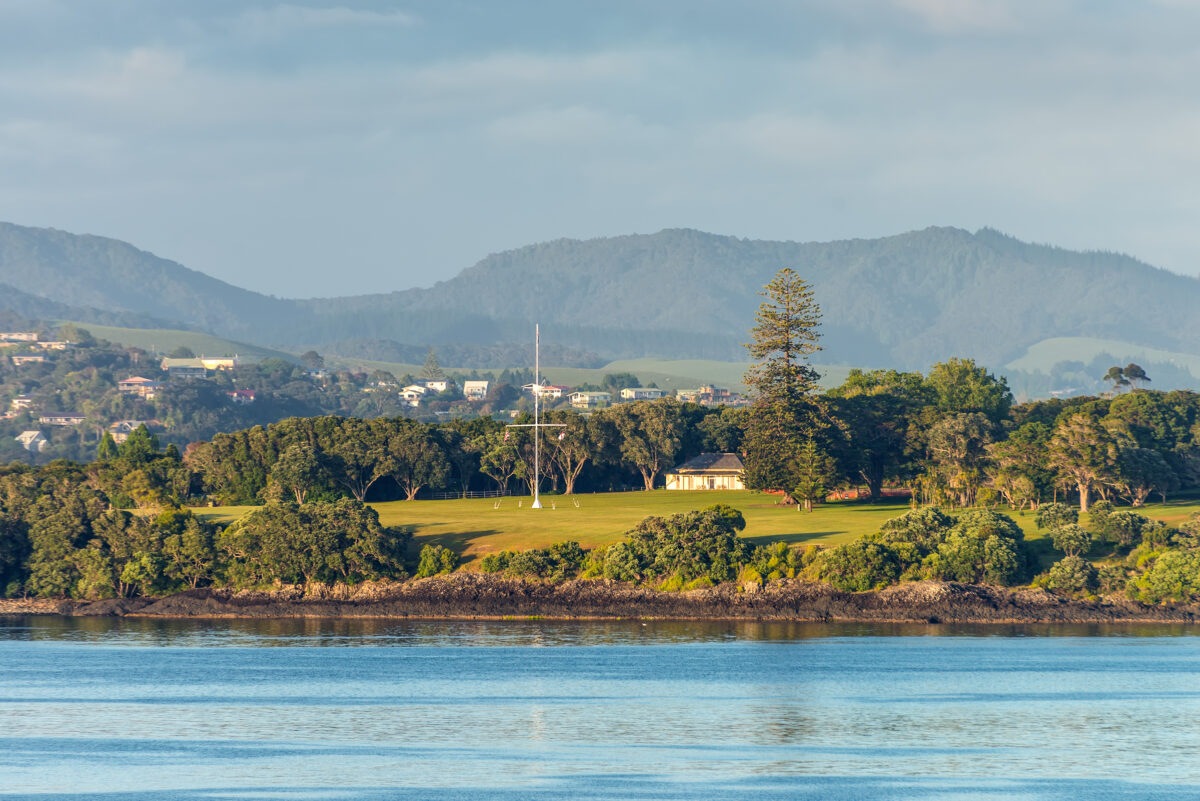 Historic Waitangi Treaty Grounds with traditional Maori meeting house and British residency in Bay of Islands